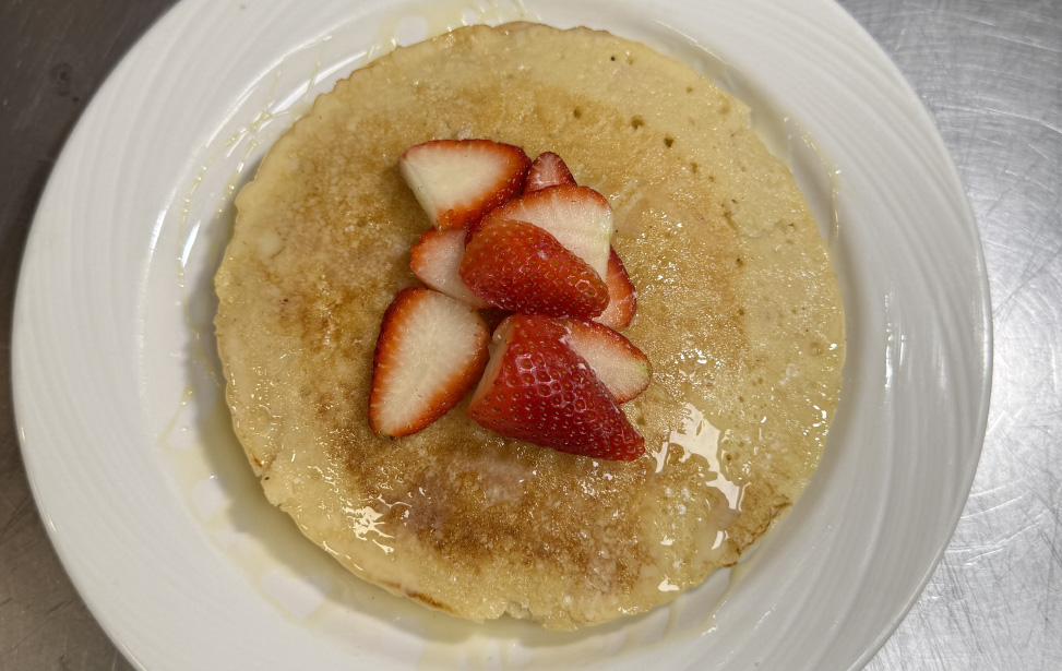 Tres leches pancakes with strawberries